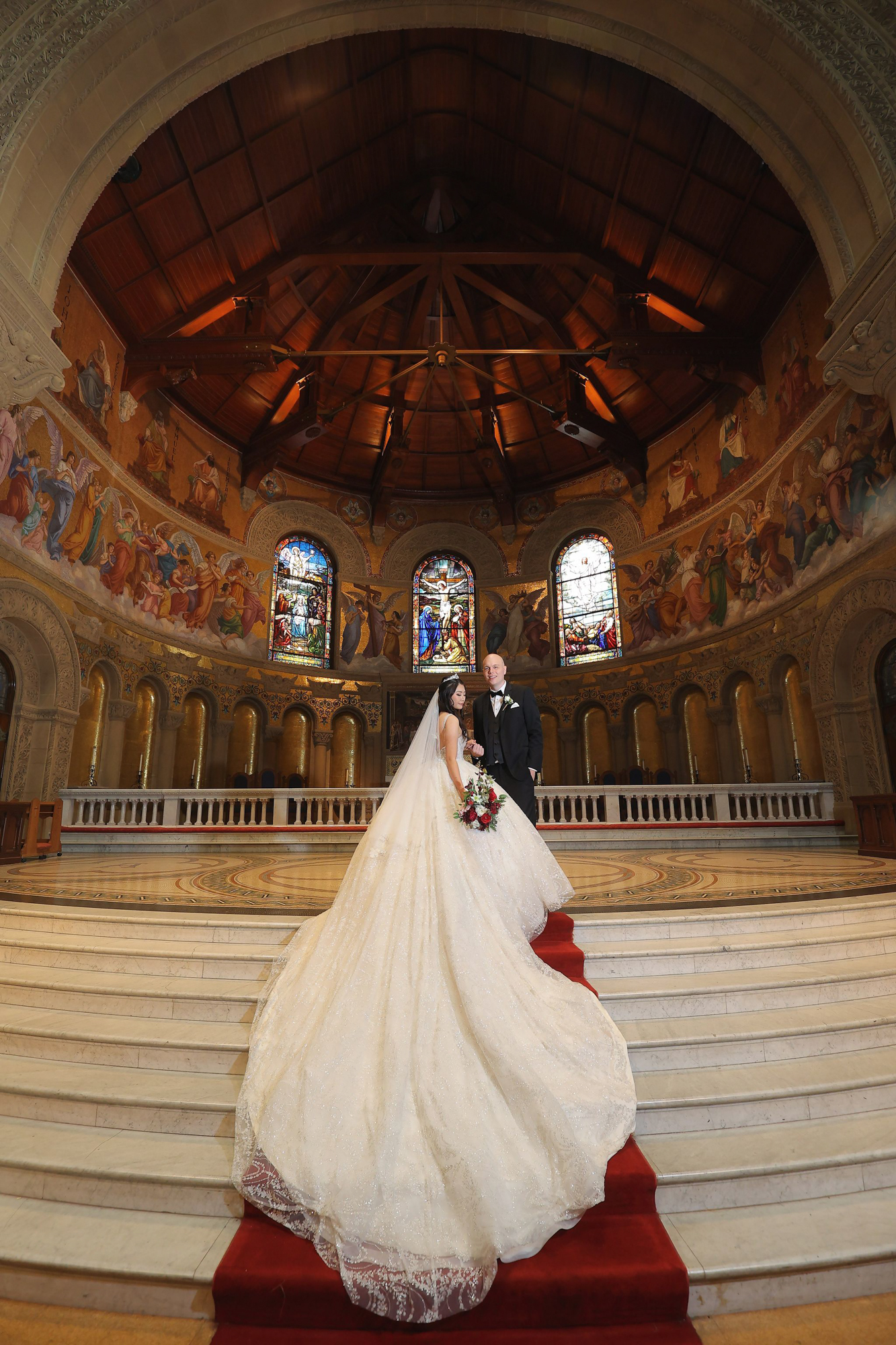 stunning church wedding photo of bride and groom at Stanford Memorial Chapel during their stanford California wedding