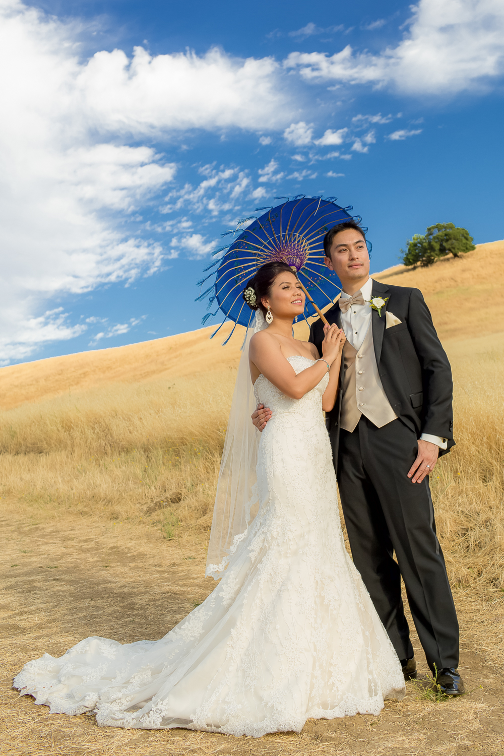 romantic bride and groom enjoying a scenic moment on a hill at The Clubhouse at Boundary Oak