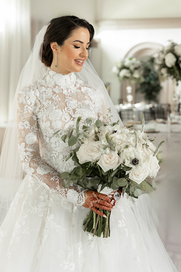 Beautiful bride posing indoors in wedding gown at The Bridges Golf Club, a scenic wedding venue in San Ramon California