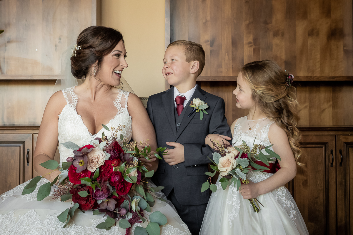 bride smiling with flower girl and ring bearer at Catta Verdera Country Club, Lincoln, California