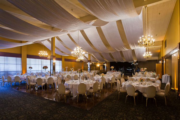 Elegant reception setup at Arden Hills Resort Club in Sacramento with stylish wedding decor and warm ambiance