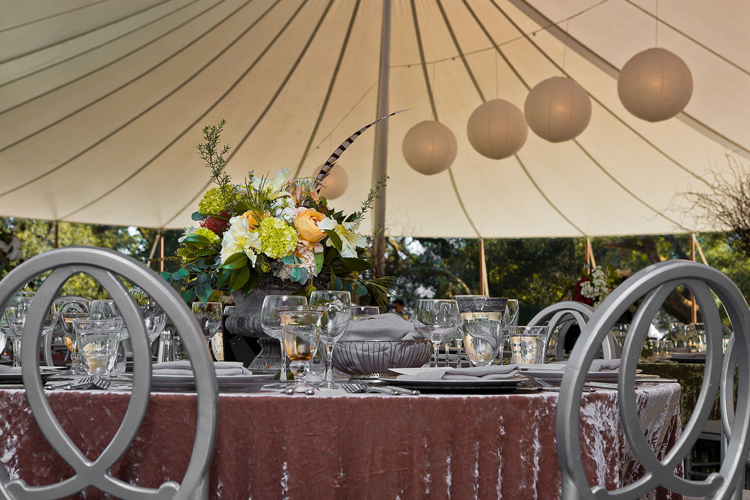Romantic reception table at Atwood Ranch in Glen Ellen with thoughtfully designed floral and decor elements