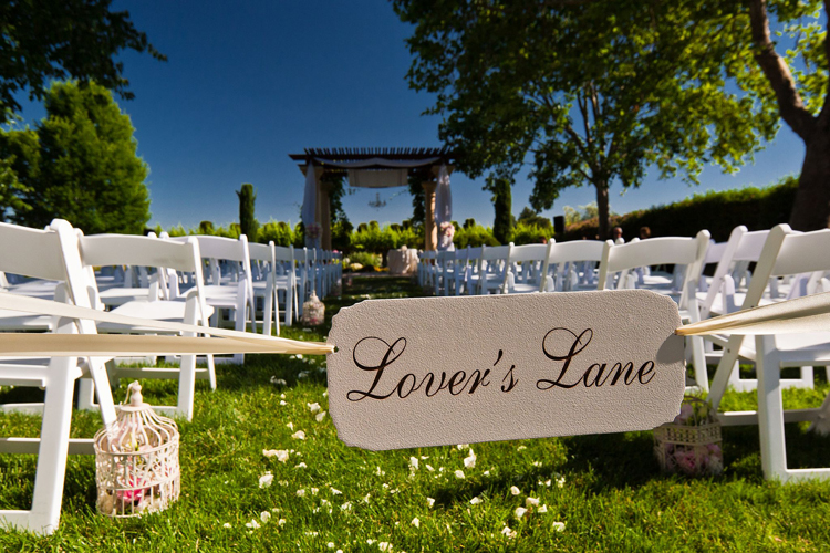 Outdoor wedding ceremony site at Vinarosa Resort & Spa in Santa Rosa featuring a romantic and scenic garden setting.