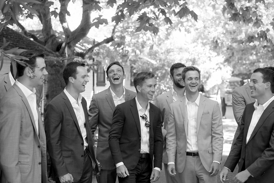 Fun groomsmen moment at Arden Hills Resort Club & Spa in Sacramento, a popular Sacramento wedding venue and photography location.