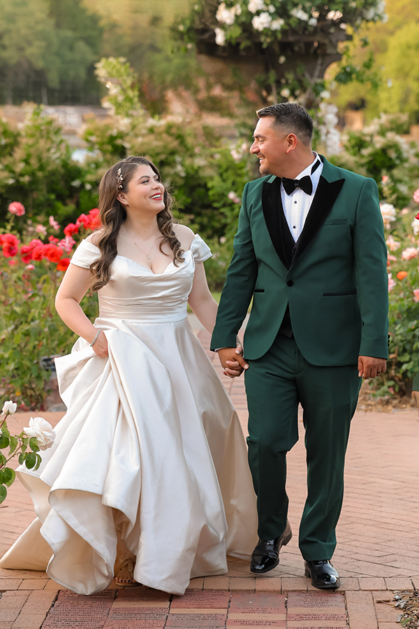 Bride and groom in garden during wedding portrait session at Heather Farm Park in Walnut Creek California