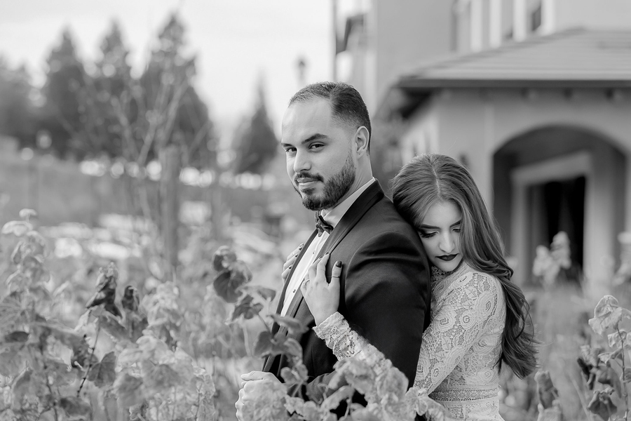 couple sharing a romantic moment together at the meritage resort and spa in napa valley during a beautiful wedding day