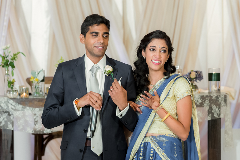Bride and groom reacting emotionally during reception speeches at Hyatt Regency Sacramento wedding