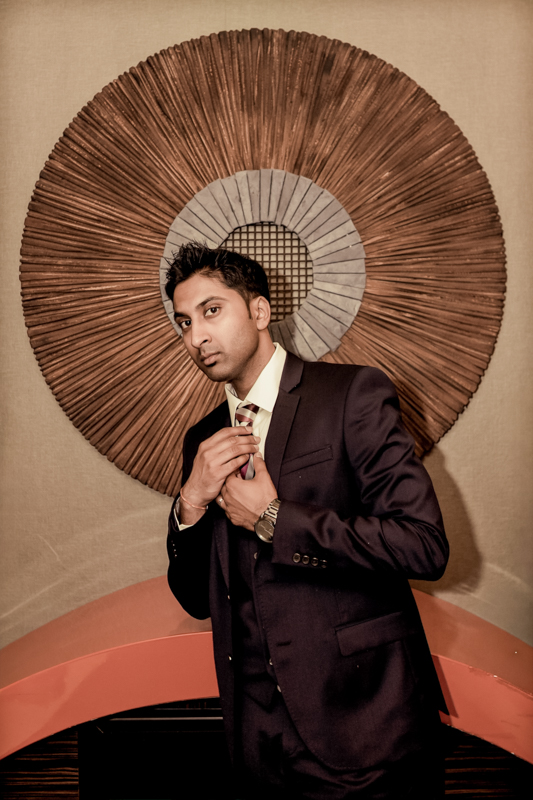 Handsome Indian groom at wedding reception inside Hyatt Regency Sacramento