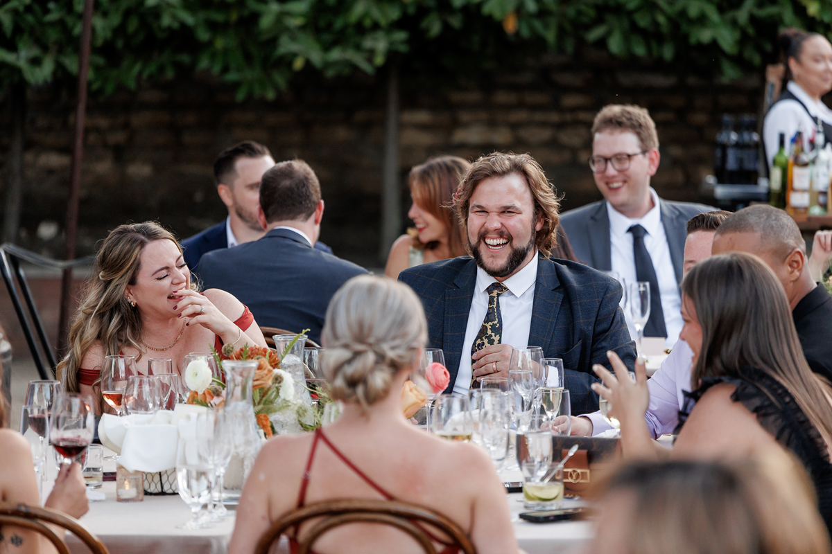 guests enjoying a fun moment during the reception at The Barns at Cooper Molera in Monterey, California