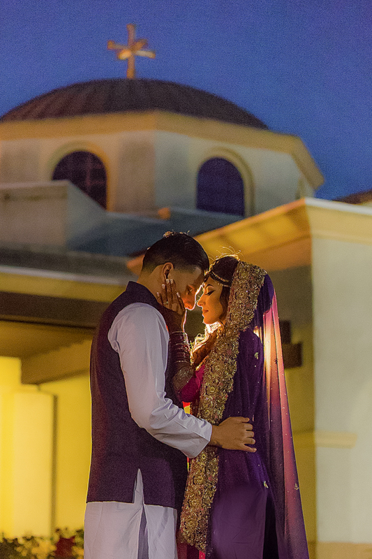 Indian bride and groom posing together at sunset during wedding portrait session in Elk Grove California