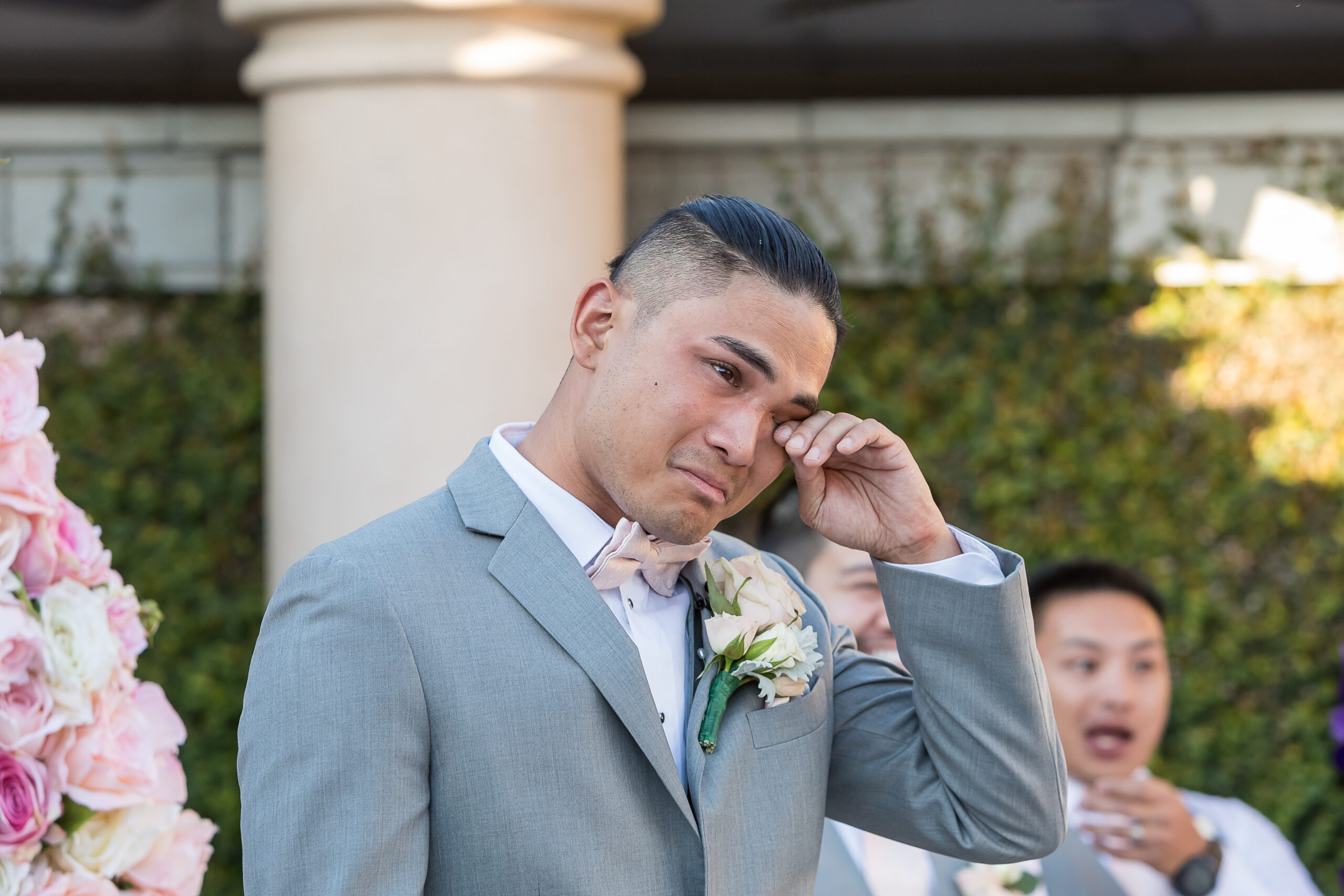 emotional groom shedding tears at the altar during his Arden Hills wedding, captured by professional California wedding photography