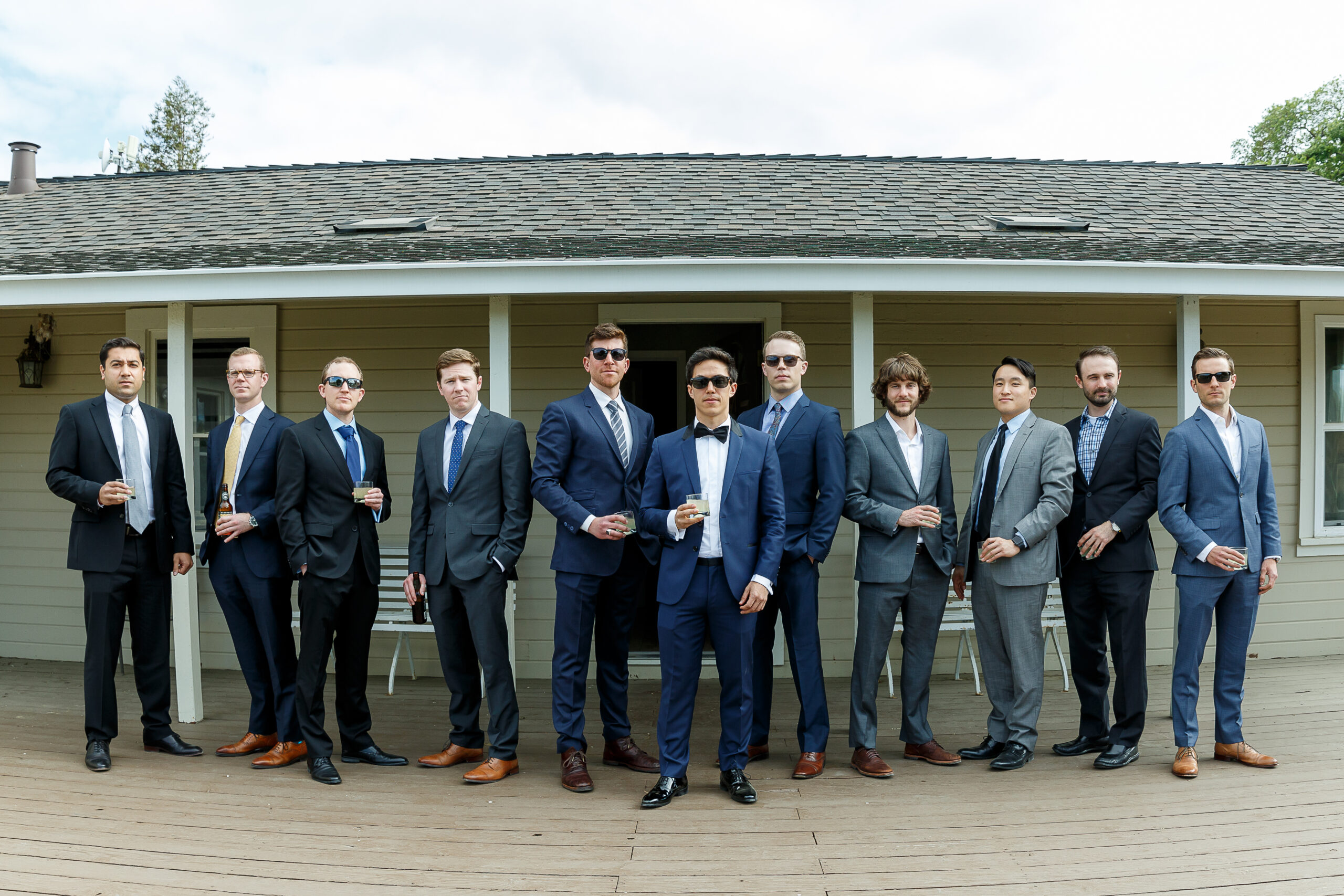 professional wedding photography of groom and groomsmen at Garré Vineyard, Restaurant, & Event Center in California