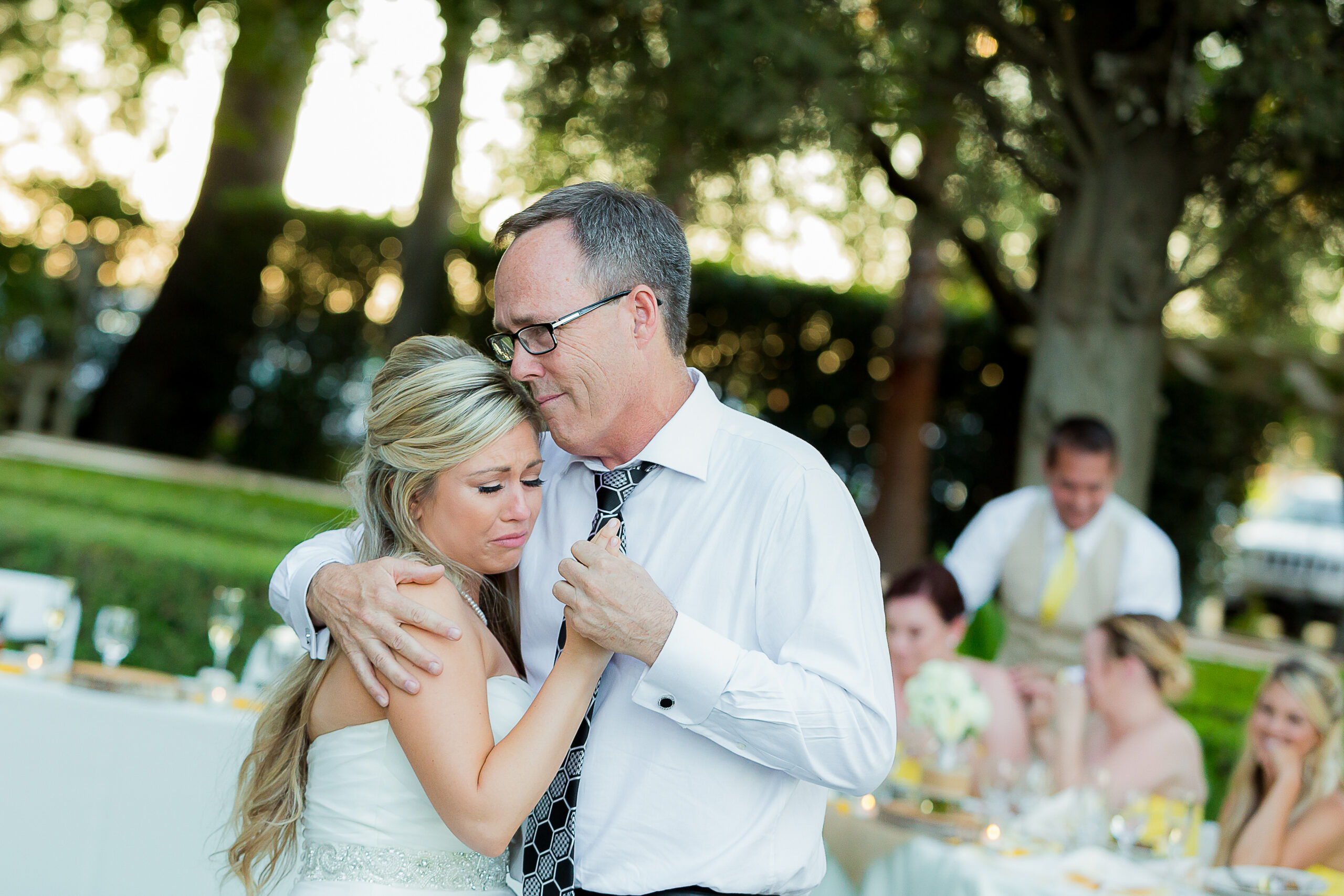 emotional father-daughter dance with bride crying at Yolanda Ranch during her wedding in woodland California