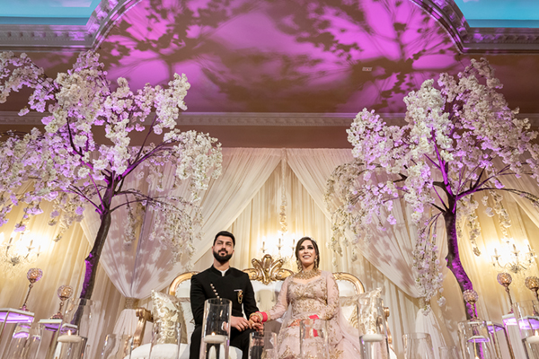 Romantic bride and groom portrait inside Mirage Event Center in Sacramento during their wedding celebration