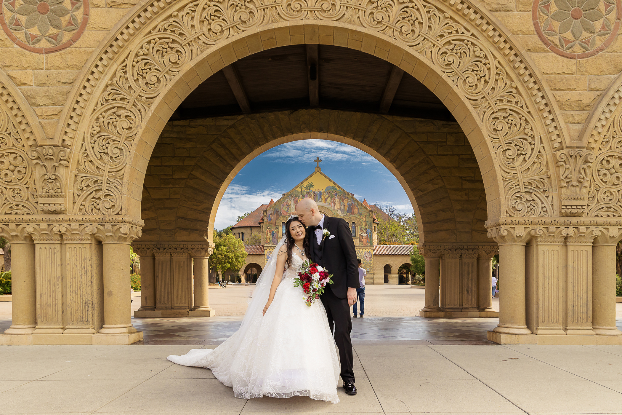 Romantic couple portrait in front of Stanford Memorial Church