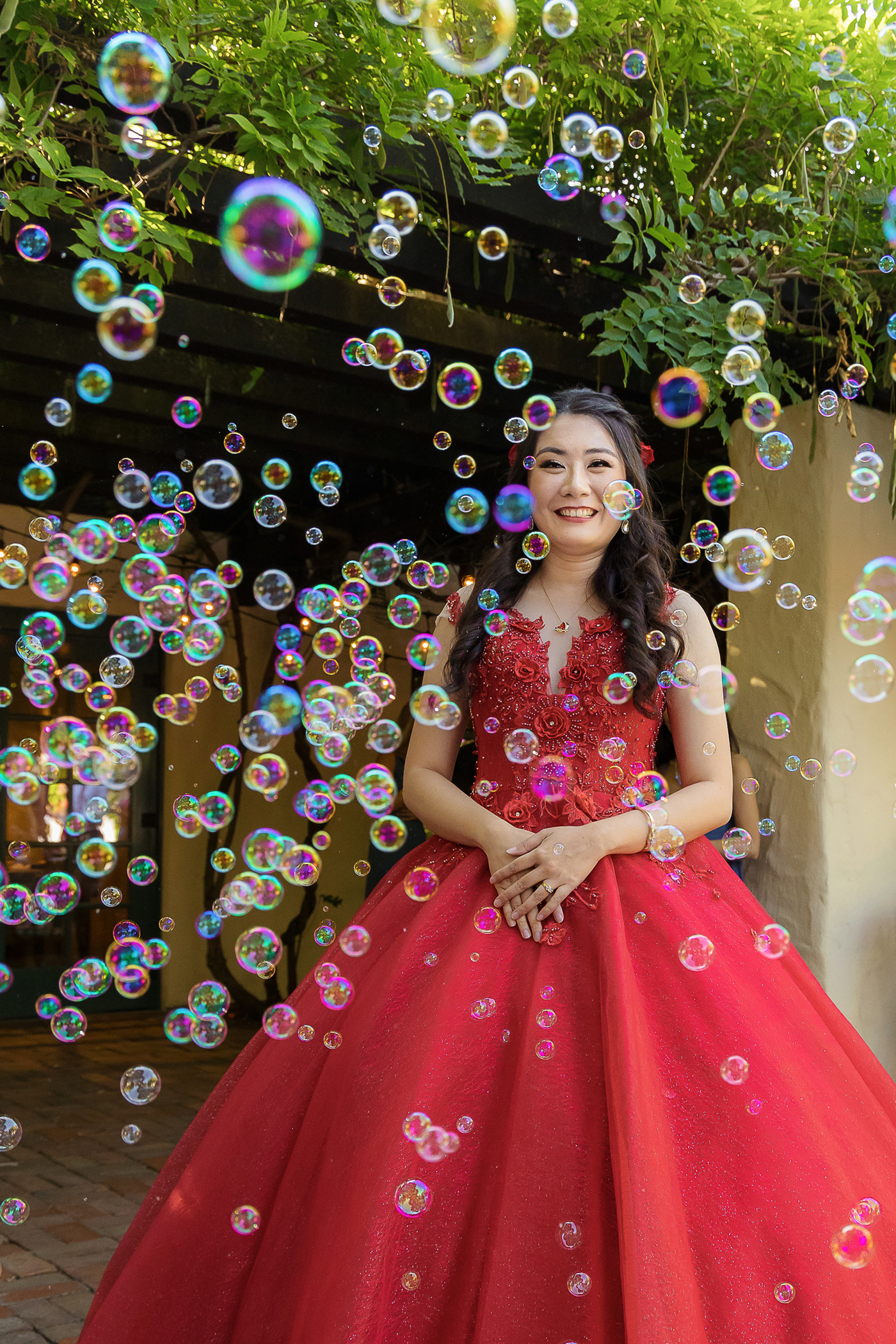 Fun reception entrance with bubbles at Allied Arts Guild