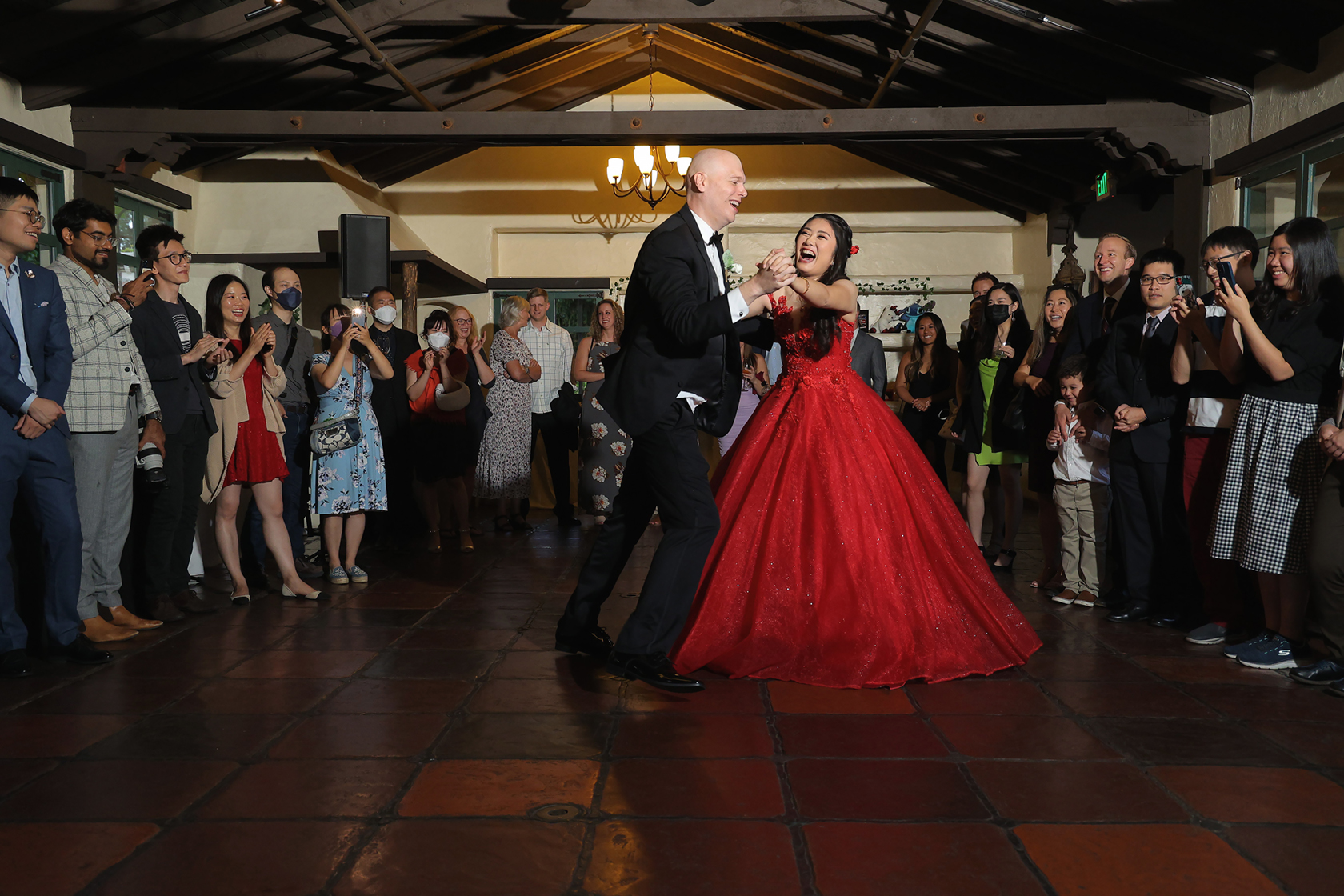 Bride and groom having fun during first dance at Allied Arts Guild in Menlo Park