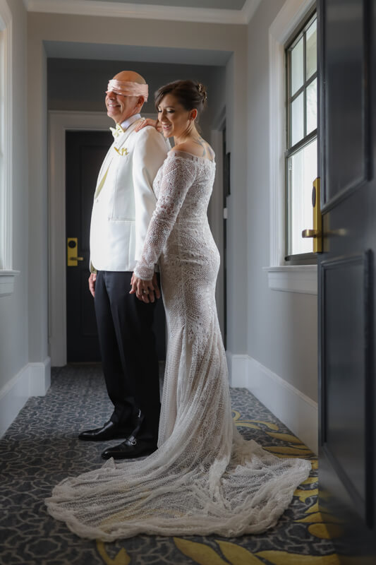 Bride and groom during a blindfolded first look at the Claremont Hotel in Berkeley, Ca