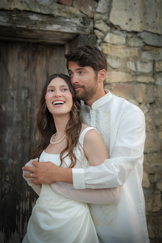 Bride and groom cuddling at Arden Hills Resort